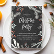 Load image into Gallery viewer, Festive chalkboard design Christmas party invitation adorned with red berries and holly, signifying elegant holiday merriment.