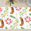 Load image into Gallery viewer, Holly Jolly Christmas Paper Placemats showcasing vibrant red and green hues, candy cane and peppermint patterns for festive table decor by Digibuddha.