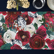 Load image into Gallery viewer, Elegant Digibuddha paper placemats showcasing a vibrant floral pattern with blooming red and white roses against a deep Christmas red backdrop. The professionally press printed, luxury placemats, measuring approximately 17x11 inches