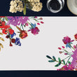 Load image into Gallery viewer, Vibrant purple and pink floral paper placemats, ideal for modern dining, bridal showers, and chic outdoor table settings.