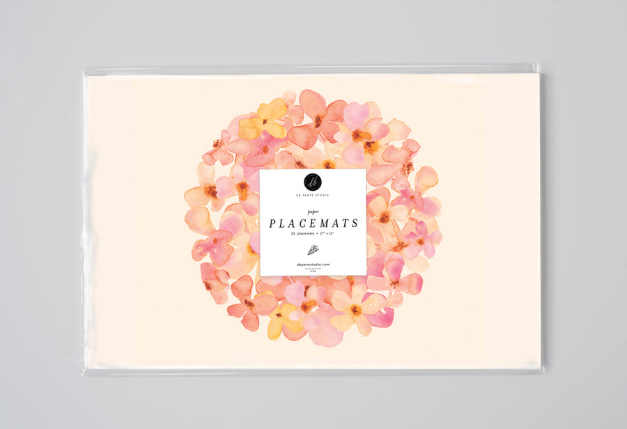 Blush watercolor hydrangea paper placemats, perfect for modern dining, bridal showers, and chic floral table settings.