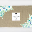 Load image into Gallery viewer, Elegant faux linen and country blue paper placemats with blue roses design, ideal for stylish dining and special occasions.