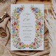 Load image into Gallery viewer, Elegant Save the Date card featuring a mix of greenery, wildflowers, and watercolor designs, perfect for announcing a spring or summer wedding.