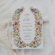 Load image into Gallery viewer, Elegant Save the Date card featuring a mix of greenery, wildflowers, and watercolor designs, perfect for announcing a spring or summer wedding.