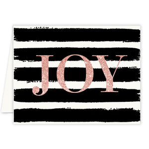 Rose gold text "joy" on a festive background of chic black and white stripes, embodying the essence of Digibuddha's Christmas cards.