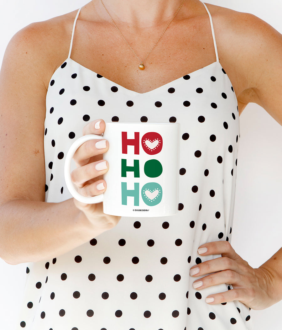 Vibrant green and red “HO HO HO” merry Christmas mug on a white ceramic mug with a glossy finish by Digibuddha