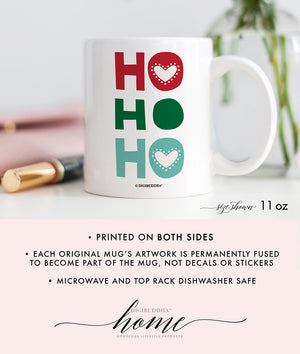 Vibrant green and red “HO HO HO” merry Christmas mug on a white ceramic mug with a glossy finish by Digibuddha