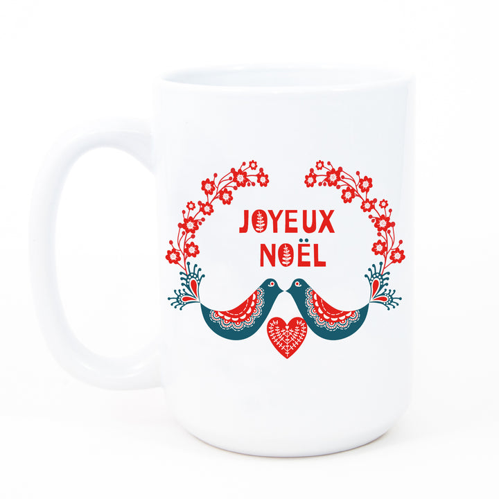 Joyeux Noel Christmas mug with red floral pattern, Christmas cardinals, wreath, and joyeux noel message