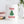 Load image into Gallery viewer, A festive Happy Holidays coffee mug featuring a vibrant Christmas tree graphic and bold red lettering, perfect for the holiday season.
