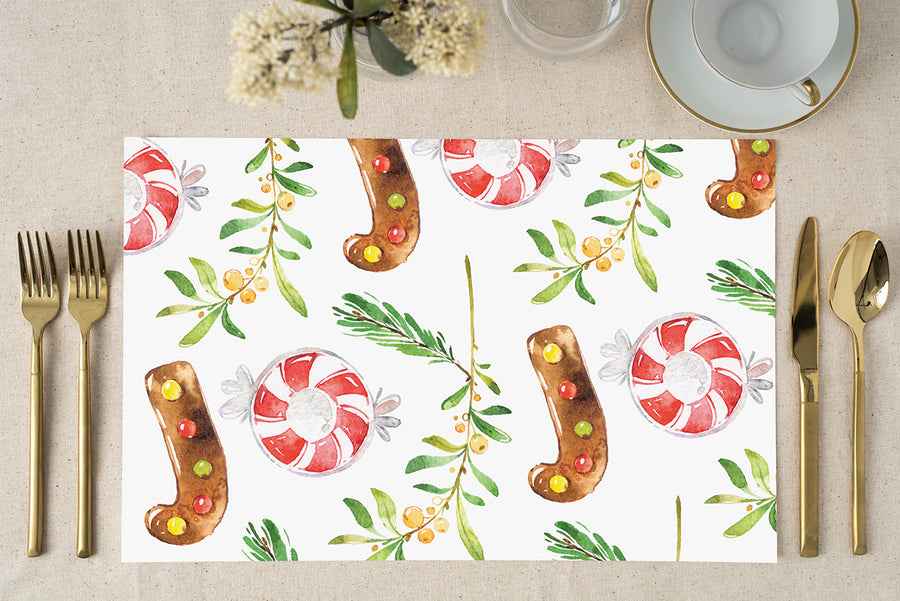 Holly Jolly Christmas Paper Placemats showcasing vibrant red and green hues, candy cane and peppermint patterns for festive table decor by Digibuddha.