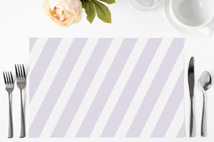 Light purple stripes paper placemats, perfect for enhancing modern dining table decor, bridal showers, and outdoor settings.