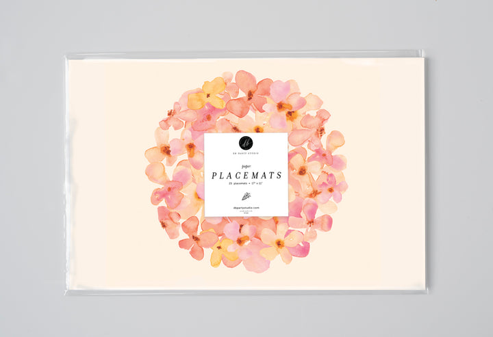 Blush watercolor hydrangea paper placemats, perfect for modern dining, bridal showers, and chic floral table settings.
