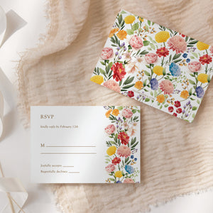 Floral garden wedding suite with wildflower and botanical accents, including wedding invitations, RSVP, and directions cards.