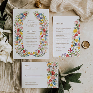 Floral garden wedding suite with wildflower and botanical accents, including wedding invitations, RSVP, and directions cards.