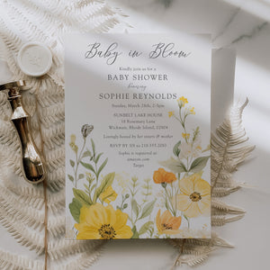 Baby in bloom shower invitation featuring yellow wildflowers, pastel hues, and sage green accents for a whimsical, gender-neutral celebration.