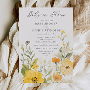 Baby in bloom shower invitation featuring yellow wildflowers, pastel hues, and sage green accents for a whimsical, gender-neutral celebration.