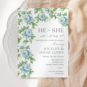 Gender reveal party invitation featuring French blue floral and sage greenery design, asking 'he or she what will baby be?' for a southern theme garden party reveal chinoiserie french blue charleston blue floral