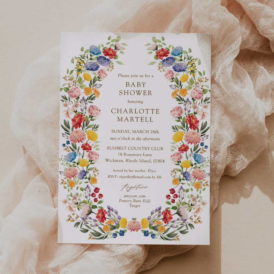 Colorful wildflower baby shower invitation card for garden theme celebration, blending purple, green, yellow, and pink florals, perfect for spring or summer boho-themed baby showers.