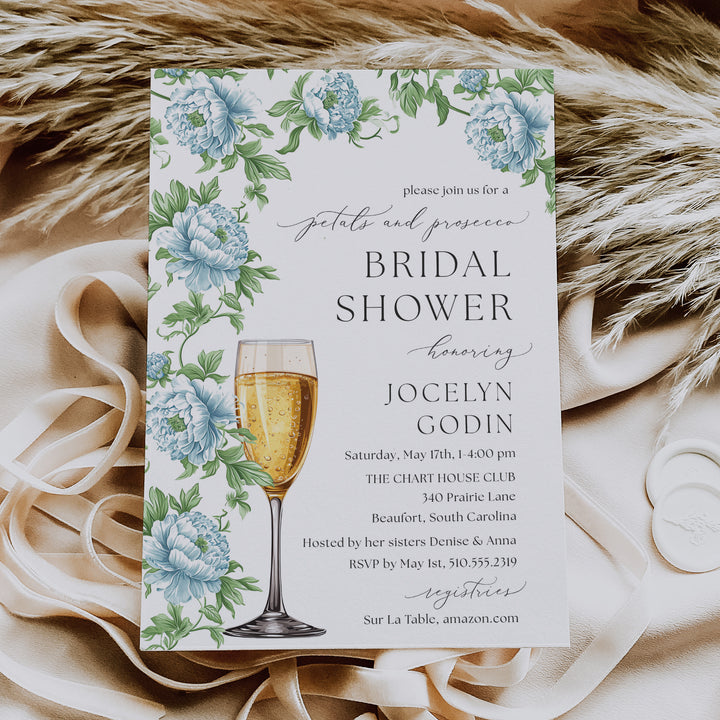 Bridal shower invitation featuring French blue florals and prosecco toast, perfect for a sophisticated garden party