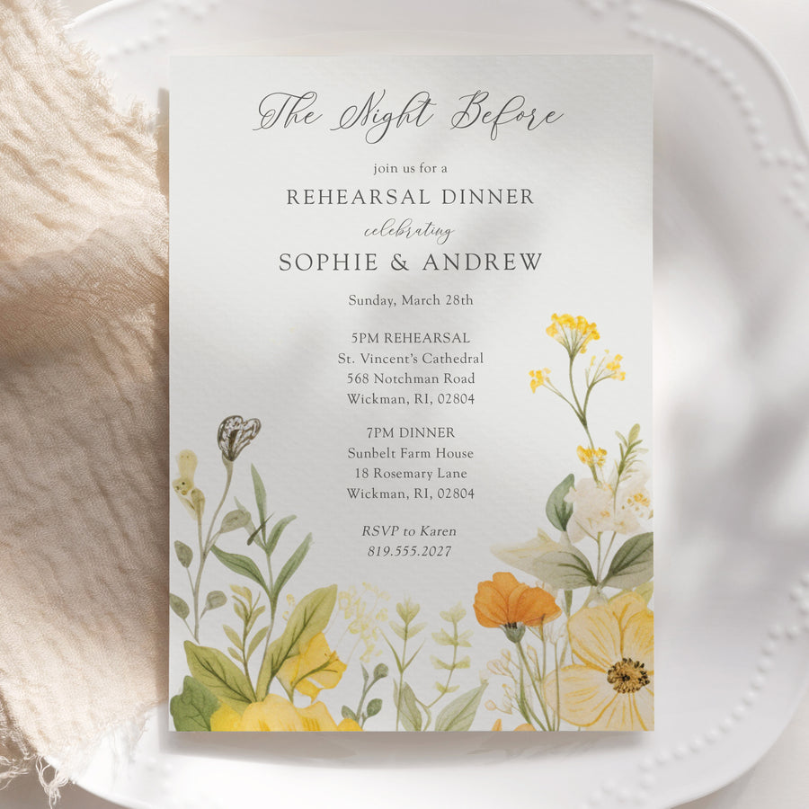 Rehearsal dinner invitation with yellow pastel wildflowers and botanical sage greenery, setting the tone for a whimsical garden party.