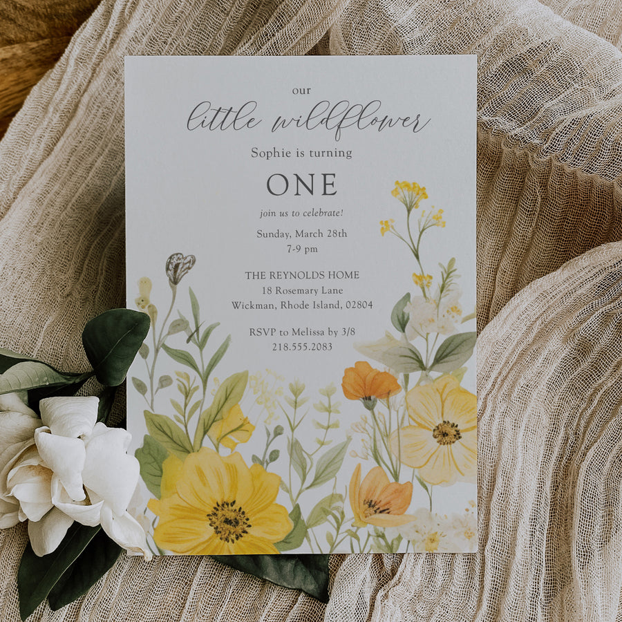 Floral 1st birthday invitation featuring sage greenery and yellow pastel watercolor wildflowers for a whimsical garden party celebration.