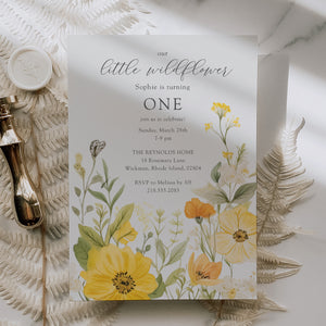 Floral 1st birthday invitation featuring sage greenery and yellow pastel watercolor wildflowers for a whimsical garden party celebration.