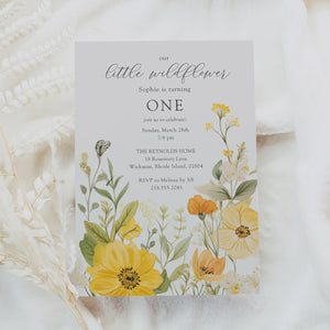 Floral 1st birthday invitation featuring sage greenery and yellow pastel watercolor wildflowers for a whimsical garden party celebration.