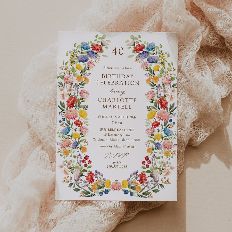 Elegant boho wildflower birthday invitation featuring a watercolor floral wreath, perfect for garden party celebrations.