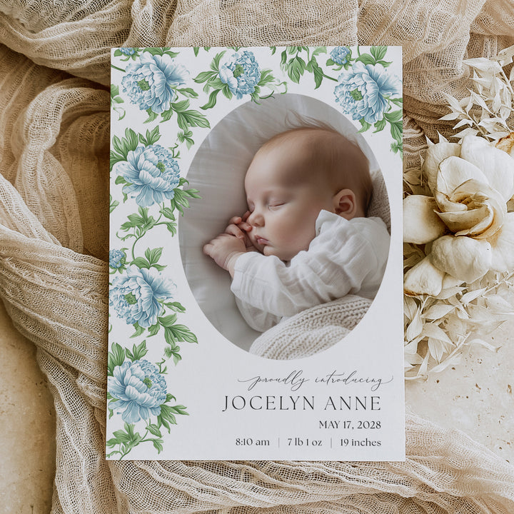 Elegant birth announcement card featuring dusty blue floral and sage green botanical designs in French blue and Charleston blue, ideal for sharing your new baby joy.