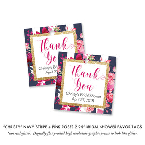 Navy blue and pink bridal shower invitation featuring pink florals, magenta accents, and navy stripes with a gold frame